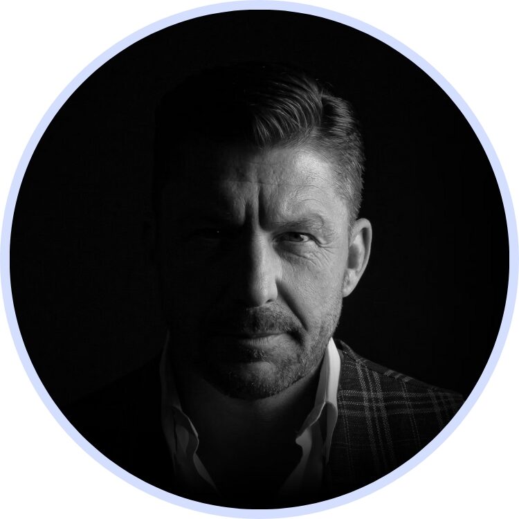 Moody black and white headshot portrait of Marco Israel, interior designer in Karlsruhe.